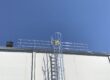 fixed ladder with walk-thru rails, cage, platform, or security door