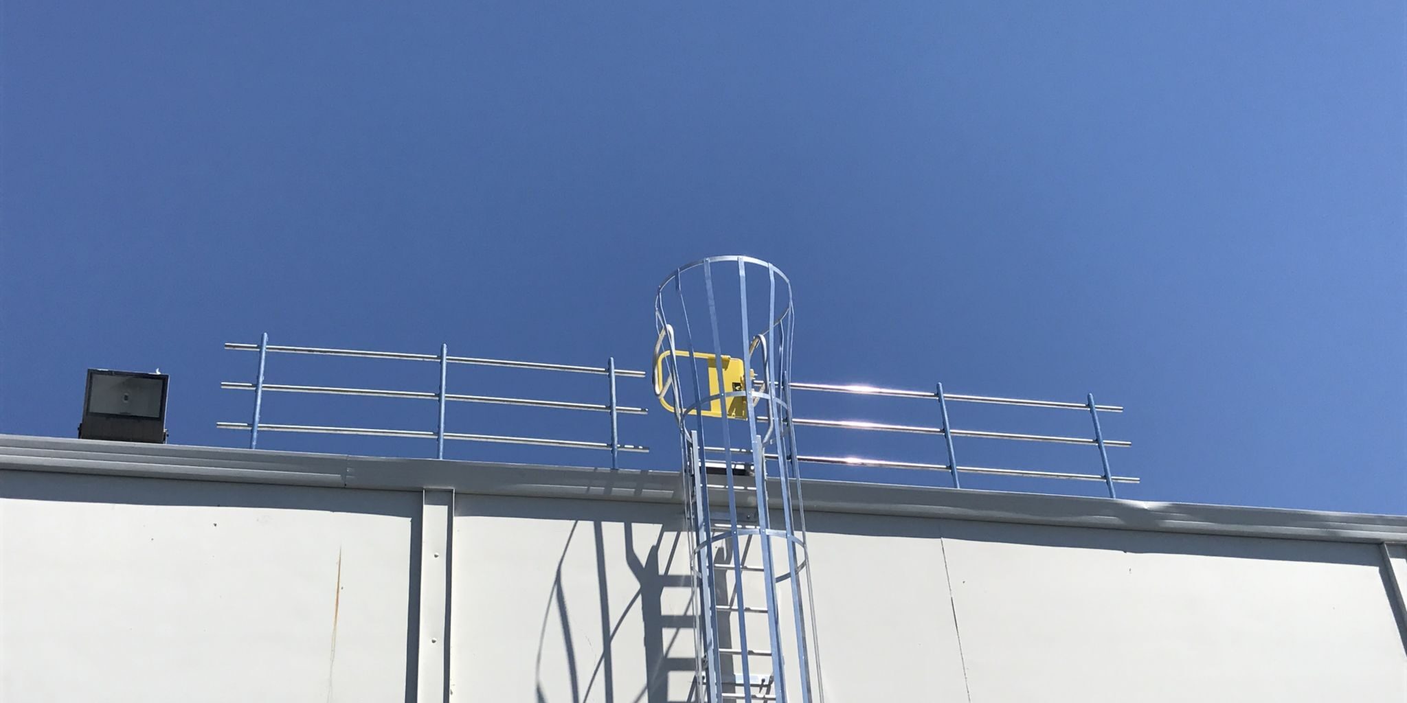 Fixed Ladder Safety Accessories fixed ladder with walk-thru rails, cage, platform, or security door